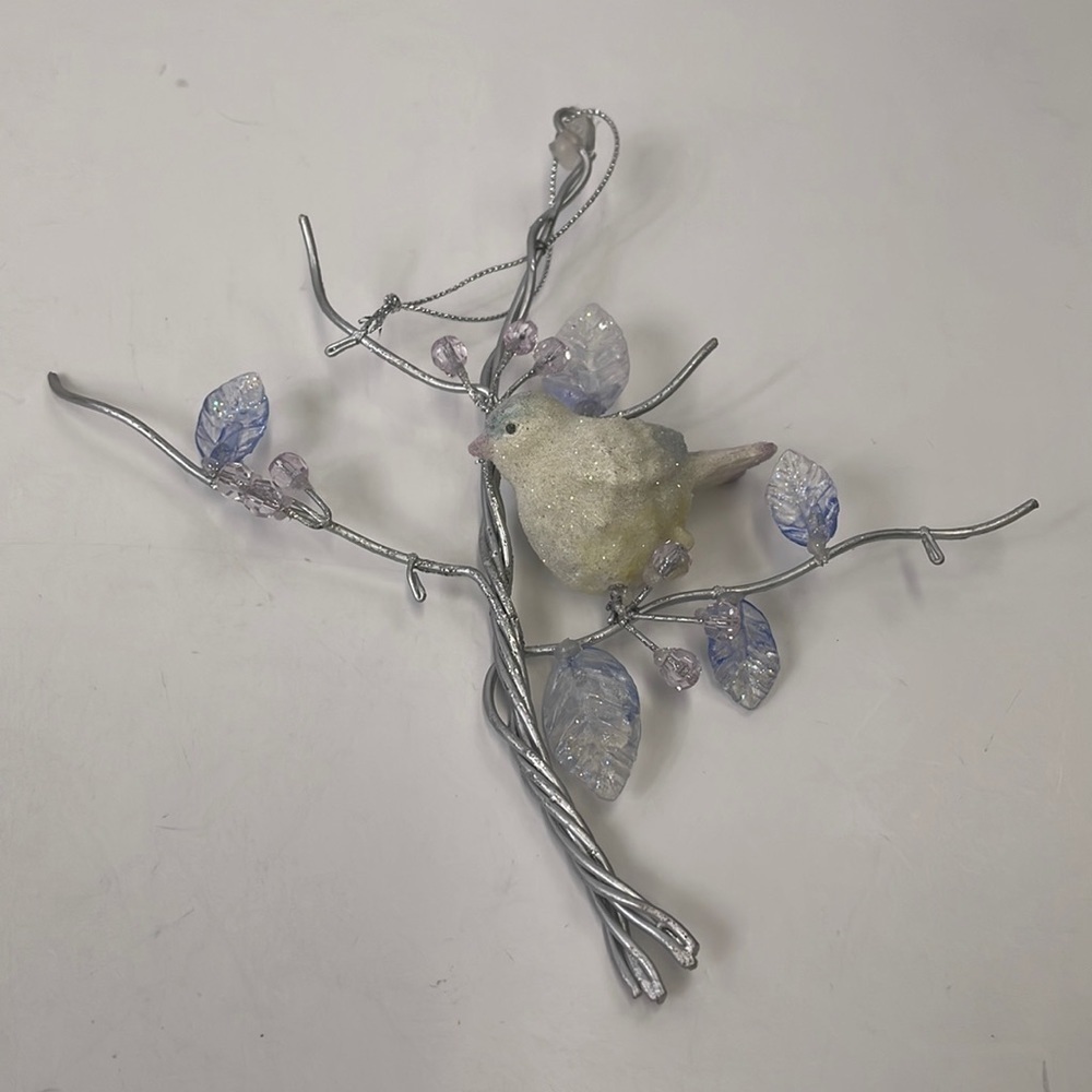 Bird on tree branch Christmas ornament